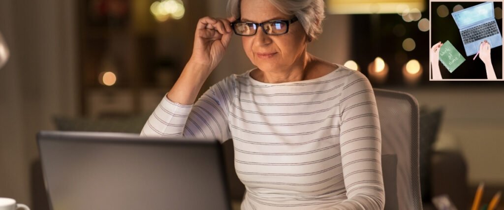 Older woman adjusting her glasses while reading a laptop screen, illustrating researching helpful content for an audience.