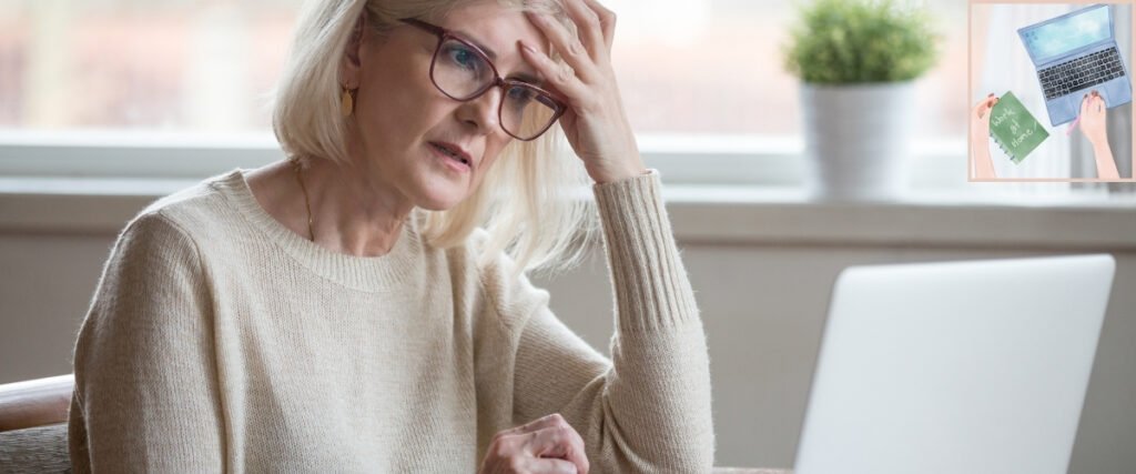 Older woman looking concerned at her laptop, illustrating the need to understand payment rules and business costs.