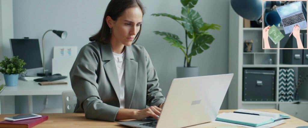 Woman working on a laptop at a home-office desk, illustrating the setup for remote administrative services.